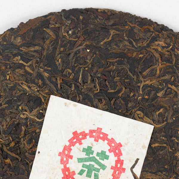 Pu-Erh Tea Cake, "Iron Mold", Import/Export Corporation, 1990s (Raw/Sheng)