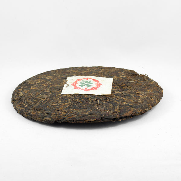 Pu-Erh Tea Cake, "Iron Mold", Import/Export Corporation, 1990s (Raw/Sheng)