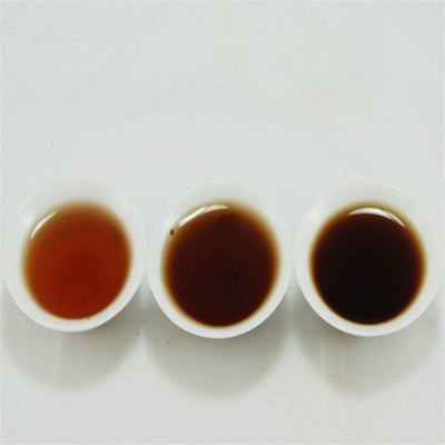 Pu-Erh Tea Cake Red Dayi 7262  Menghai Tea Factory, 2003 (Black/Shou)