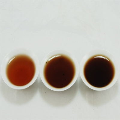 Pu-Erh Tea Cake Red Dayi 7262 Menghai Tea Factory, 2003 (Black/Shou)