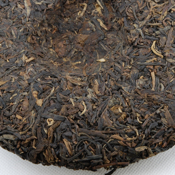 Pu-Erh Tea Cake, Yiwu Mountain Wild Arbor Tea , Year 2003 (Raw/Sheng)