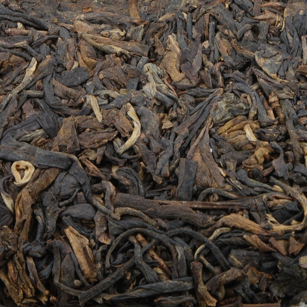 Pu-Erh Tea Cake, Yiwu Mountain Wild Arbor Tea , Year 2003 (Raw/Sheng)