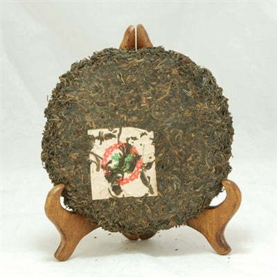Pu-Erh Tea Cake, Import/Export Corporation, 1990s (Green/Sheng)