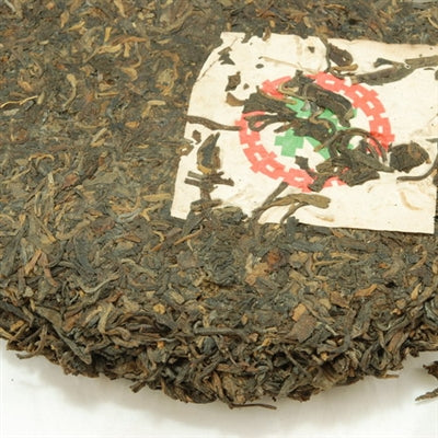 Pu-Erh Tea Cake, Import/Export Corporation, 1990s (Green/Sheng)