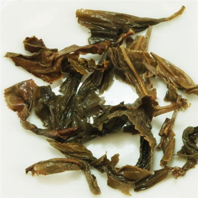 Pu-Erh Tea Cake, Wild Arbor Tree, Kunming Die Cai Qing Tea Factory, 2004 (Green/Sheng)