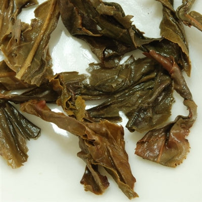 Pu-Erh Tea Cake, Wild Arbor Tree, Kunming Die Cai Qing Tea Factory, 2004 (Green/Sheng)