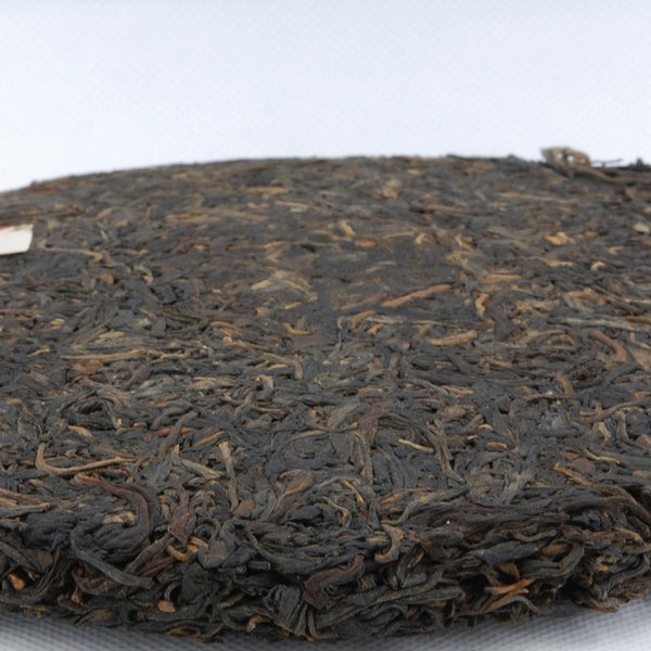 1990's Jiang Cheng Spring Tips Pu-erh Tea Cake (Raw/Sheng)