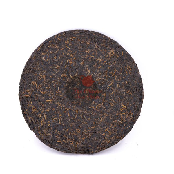 2005 Mengku Palace Tea Cake，(Ripe/Shou)