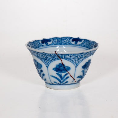 Antique Qing Dynasty Repaired Porcelain Blue And White Floral Motifs Tea Cup, Kangxi (1661-1722)