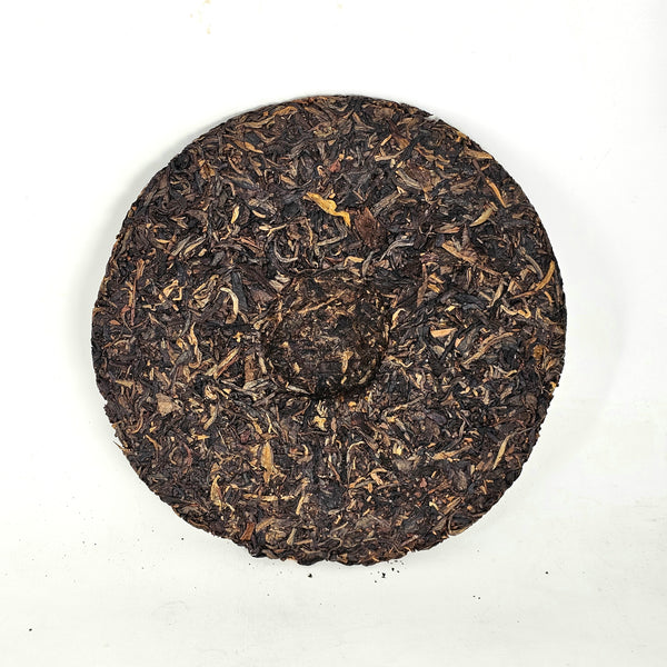 2006 Six Famous Tea Mountain, Organic Ban Zhang Tea Cake, Tji Pin (Raw/Sheng)
