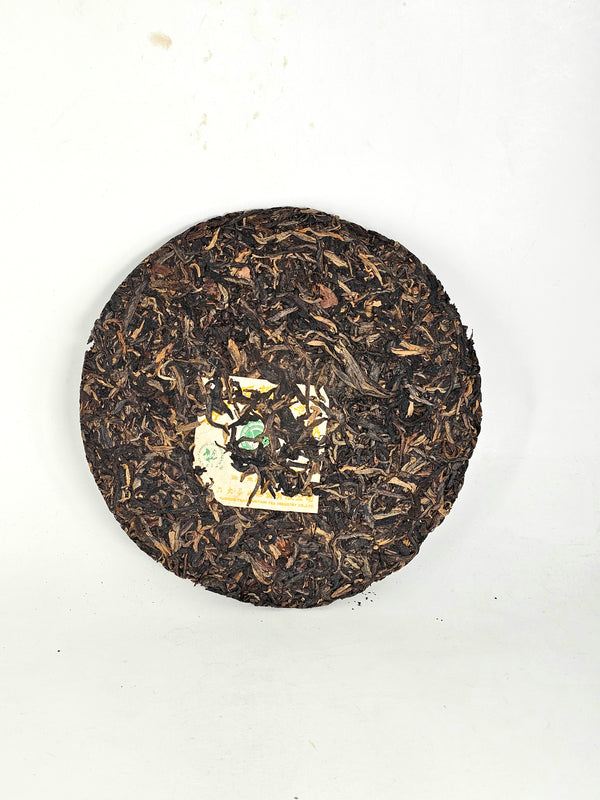 2006 Six Famous Tea Mountain, Organic Ban Zhang Tea Cake, Tji Pin (Raw/Sheng)