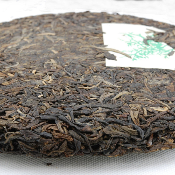 Pu-Erh Tea Cake, Yiwu Mountain Wild Arbor Tea , Year 2003 (Raw/Sheng)