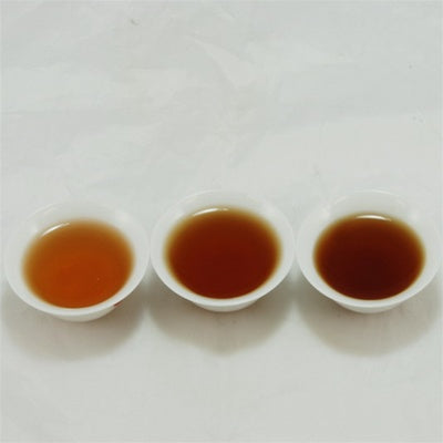 Pu-Erh Tea Cake, 7542 , Menghai Tea Factory, 1980's (Raw/Sheng)