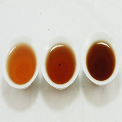 Pu-Erh Tea Cake, 7542 Orange Mark, Menghai Tea Factory, 1997s (Raw/Sheng)